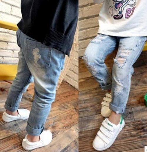 Джинсы рваные с ботильонами. Дырки