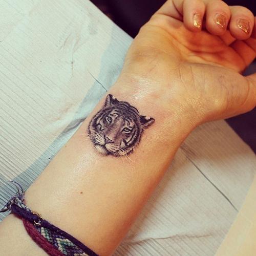 Тату тигрицы для девушек на руке. Тату «Тигр». Значение у девушек и парней